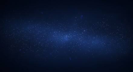 Fototapeta premium A serene night sky filled with twinkling stars against a deep blue backdrop.