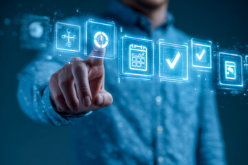 Business professional interacting with digital workflow icons in a futuristic environment