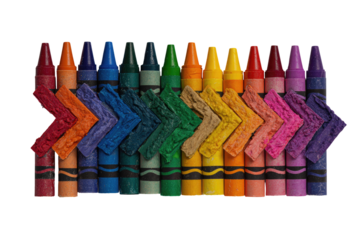 Crayons arranged in a row, with small, worn pieces of crayon in an arrow shape between them