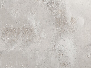Neutral beige and gray textured surface resembling concrete or natural stone. Ideal for minimalistic designs, backgrounds, architecture, or product mockups.