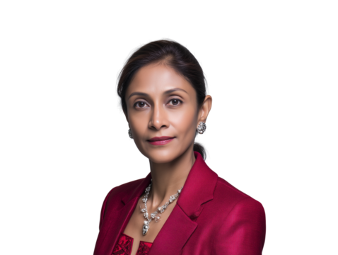 Professional corporate headshot of a confident and poised South Asian businesswoman looking at the camera. An inspiring and successful female leader isolated on a clean white background.