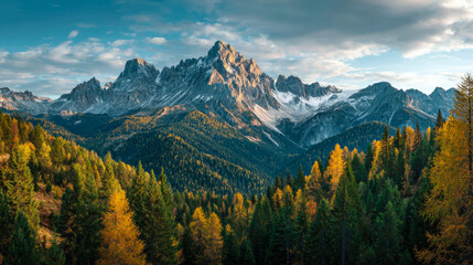 Obraz premium Majestic mountain landscape with lush forests during autumn