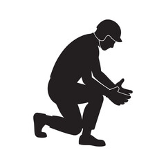 Silhouette of a baseball catcher in a crouched position ready to receive a pitch