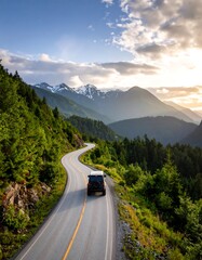 Winding mountain road with vehicle