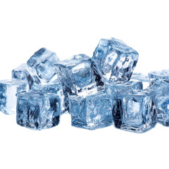 Obraz premium Ice cubes stacked neatly on a white surface, showcasing their clarity and texture under bright lighting