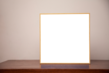 A painting on a bench on a wooden table. Frame concept. Memory concept. .Space for text.