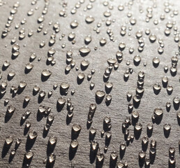 drops of water on cardboard