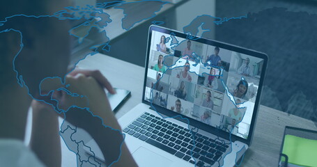 Leaning office worker clasping chin, participating in virtual meeting at home office with laptop