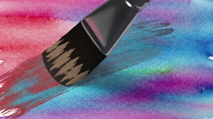 A close-up video of a paintbrush moving across a surface, leaving a beautiful stroke of pastel watercolor paint. - Powered by Adobe