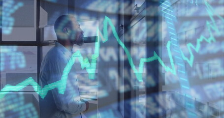 Standing analyst in business attire observing chart overlay on high-rise office window, copy space