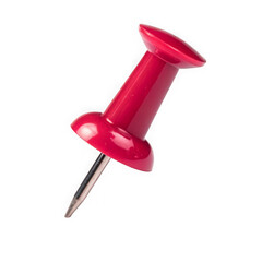 Single red push pin against a black background
