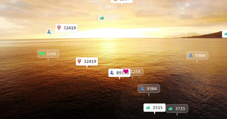 Floating social media icons drifting over ocean at sunset, with bubbles showing likes and followers