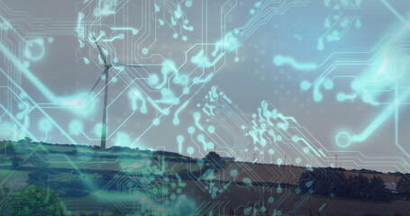 Rising wind turbine towering above rolling farmland, glowing with translucent circuit board overlay