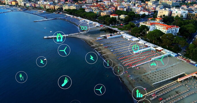 Showing beach with swimwear beachgoers on loungers under umbrellas, with energy icons, copy space