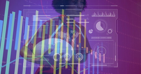 Standing athlete holding sports ball in studio, showing bar, pie charts and world-map overlays