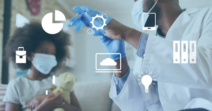 Masked doctor in lab coat putting on glove in living room, with digital icons, copy space