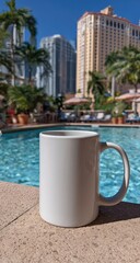 Empty white mug by pool, city view