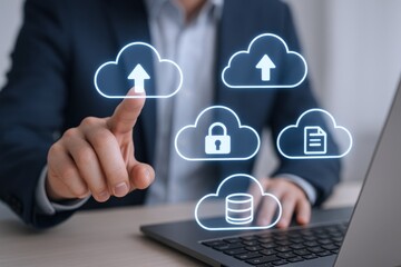 Cloud Computing Concept: Man Interacting with Cloud Icons for Data Storage and Processing on Laptop