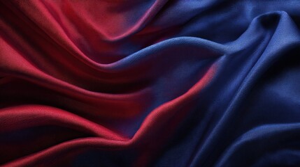 Obraz premium Elegant red and blue silk fabric with soft, flowing folds and dramatic lighting creating a luxurious and abstract background of contrasting colors and textures