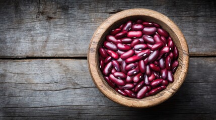 Red kidney beans in rustic wooden bowl