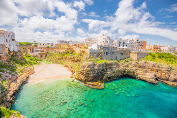 View of Polignano a Mare beach in Italy. Top tourist destinations in Italy. Trip to Europe.