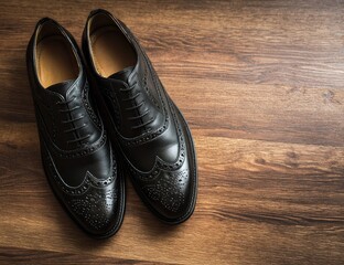 Black brogues on a wooden surface