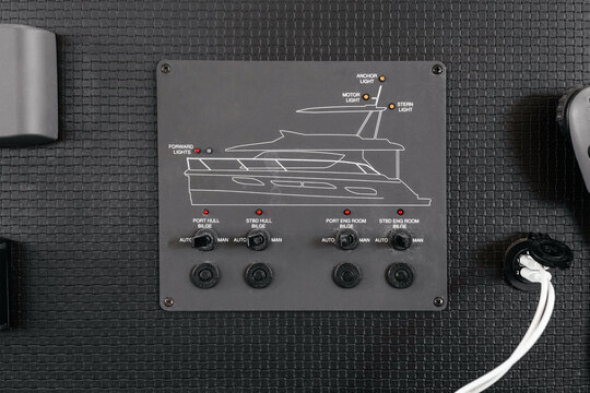 Control board of modern yacht, ship, boat. Close-up of navigational control panel on grey background - Powered by Adobe