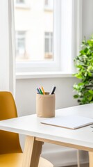 Fototapeta premium Bright and Minimalist Home Office Workspace with Natural Light, Clean Desk Setup, and Modern Stationery for Enhanced Productivity and Study.
