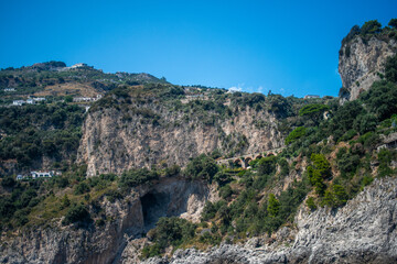 Naklejka premium A stunning panoramic view of the Mediterranean Sea from the mountainous terrain along Italy’s Amalfi Coast.