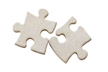 Two light beige puzzle pieces joined, forming a heart shape
