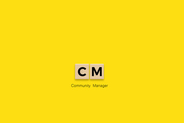 Community Manager.Letter Tiles on Yellow Background. Minimal Aesthetics.