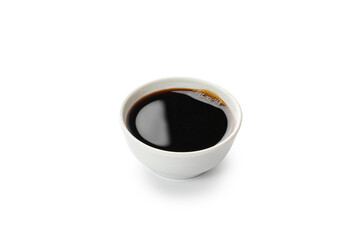 Black Soy sauce in a white little bowl, gravy boat isolated on white background with clipping path, cut out.