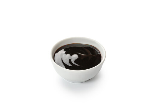 teriyaki sauce in a white little bowl, gravy boat isolated on white background with clipping path, cut out.