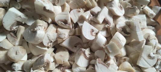 Close up shot of sliced raw mushrooms.