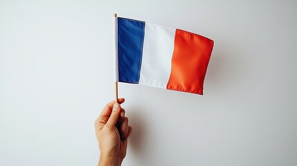 Hand Holding French National Flag for Bastille Day, Celebration, Cultural Symbol Scenarios