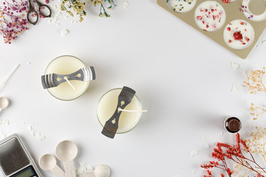 Banner with equipment, tools for candles making. Silicone mold, jars, wicks, coconut or organic soy wax. Flatlay. Copy space.