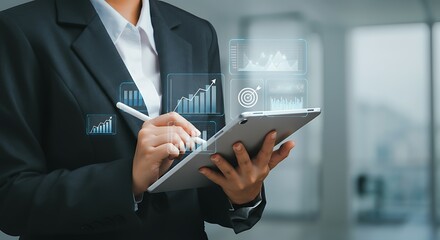 Businesswoman Analyzing Financial Data on Tablet with Digital Graphics Displaying Market Trends and Growth Opportunities for Modern Business Strategy and Investment