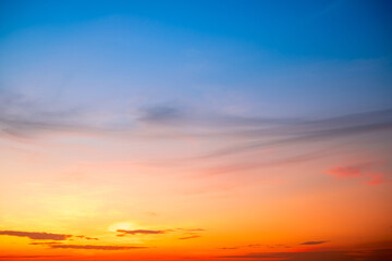 Beautiful , luxury soft gradient orange gold clouds and sunlight on the blue sky perfect for the background, take in evening,Twilight, Large size, high definition landscape photo