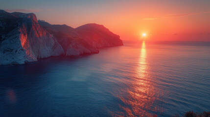 Coastal Cliffs at Sunset: Ocean reflects the fiery sky, illuminating the dramatic coastline and mountains.