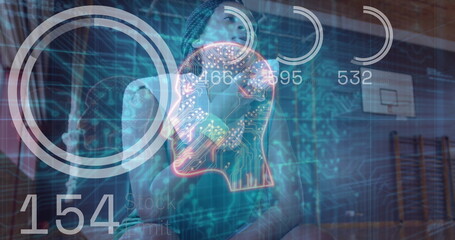 Tracking athlete wearing jersey generating performance metrics in gym, with basketball hoop and HUD