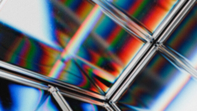 Abstract prism effect with rainbow spectrum on glass surfaces forming sharp geometric lines. Futuristic colorful texture ideal for digital backgrounds and creative projects. Geometric glass reflection