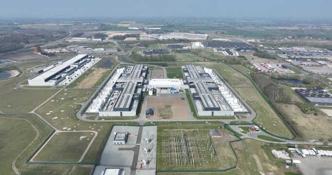Aerial view of a massive data center facility in Odense, Denmark