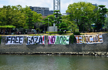 Hiroshima, Japan - August 6, 2025. Message “FREE GAZA! NO MORE GENOCIDE” at Peace Memorial Park.