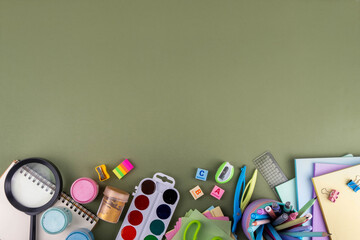 School equipment flat lay. Various school education and office supplies, accessories. Back to school sale background top view copy space