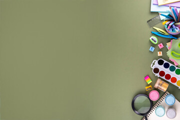 School equipment flat lay. Various school education and office supplies, accessories. Back to school sale background top view copy space