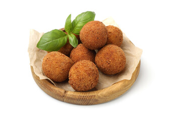 Delicious fried croquette balls and basil isolated on white