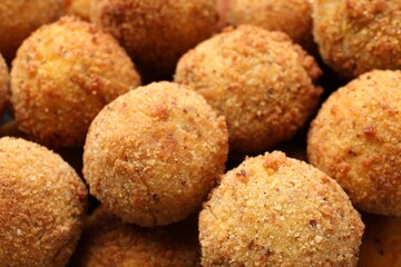 Delicious fried croquette balls as background, closeup