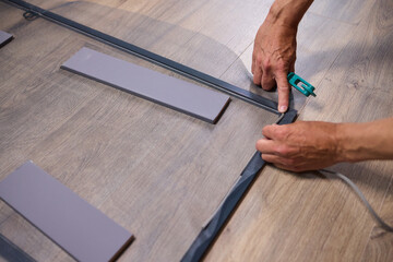 The process of cutting vinyl flooring accurately is essential for achieving a perfect fit