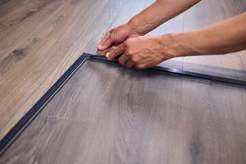 The process of cutting vinyl flooring accurately is essential for achieving a perfect fit