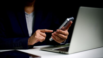 Businesswoman Using Smartphone and Laptop for Online Communication – Modern Office Work, Mobile Technology, Remote Working, Digital Lifestyle, Social Media, Wireless Connection, Virtual Team.